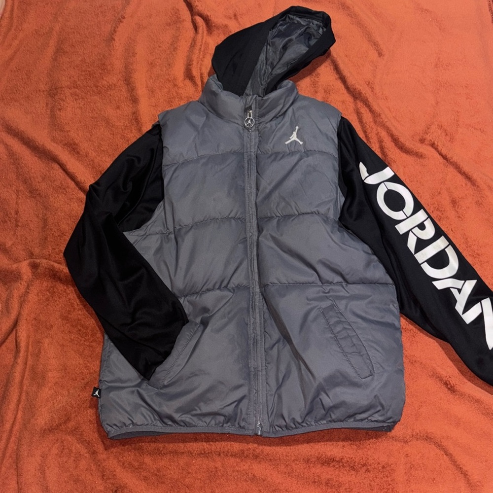 Black and grey Jordan puffer coat
